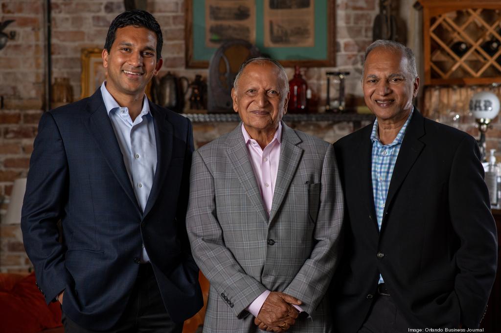 Park Square Enterprises co-CEO Vishaal Gupta; Braham Aggarwal, his grandfather; and co-CEO Suresh Gupta, his father