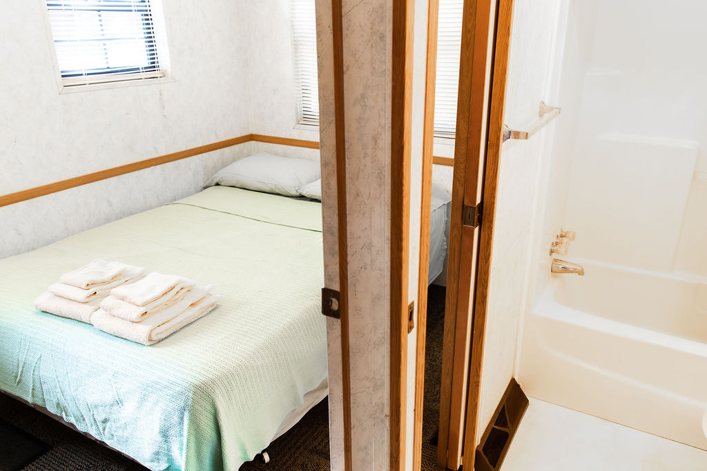 bedroom and bathroom at Pine Lake Retreat