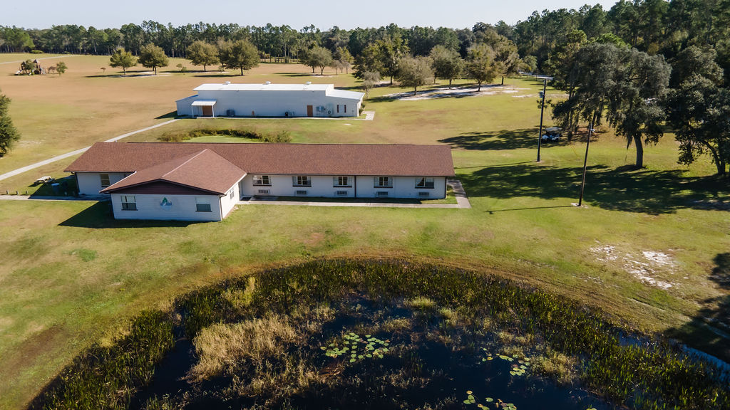 aerial view of buildings and land at Pine Lake Retreat