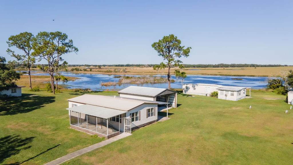 buildings by a lake at Pine Lake Retreat