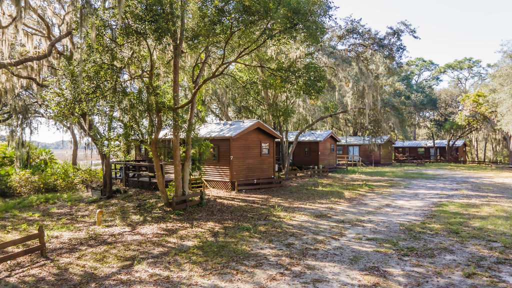 cabins along a trail at Pine Lake Retreat