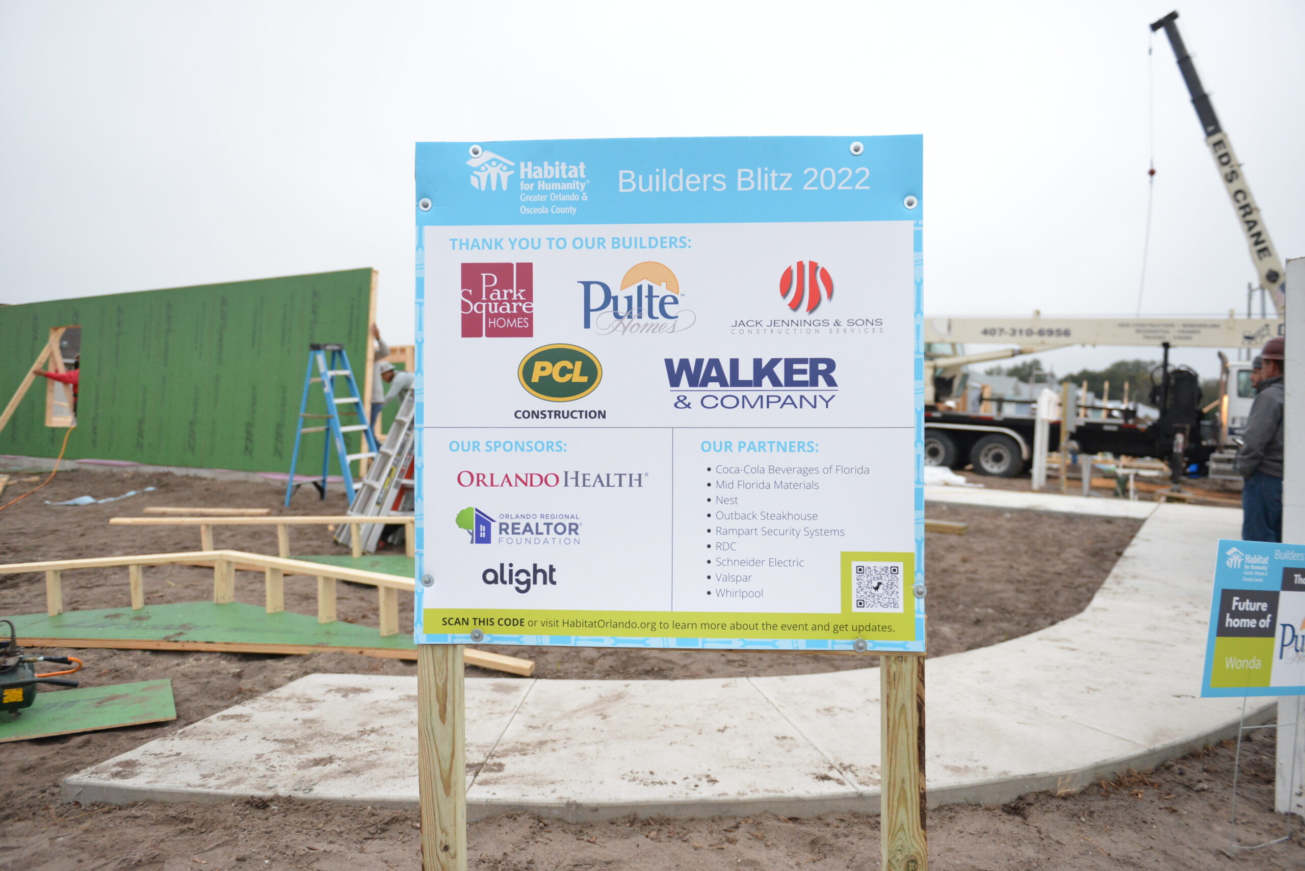 Sign with sponsors in front of construction for Builders Blitz 2022 with Park Square Homes